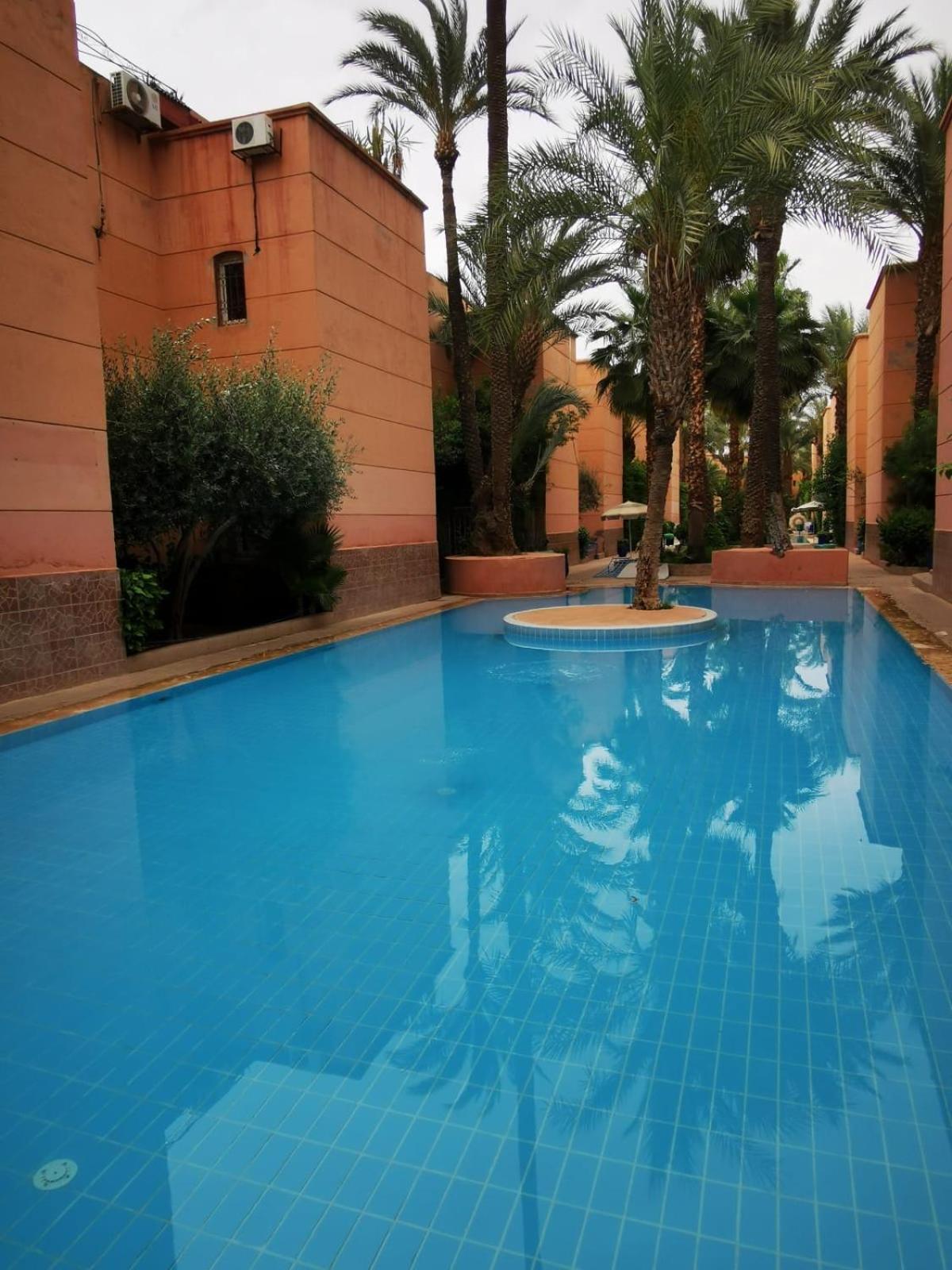 Riad Palmier Fleuri Marrakesh Bagian luar foto